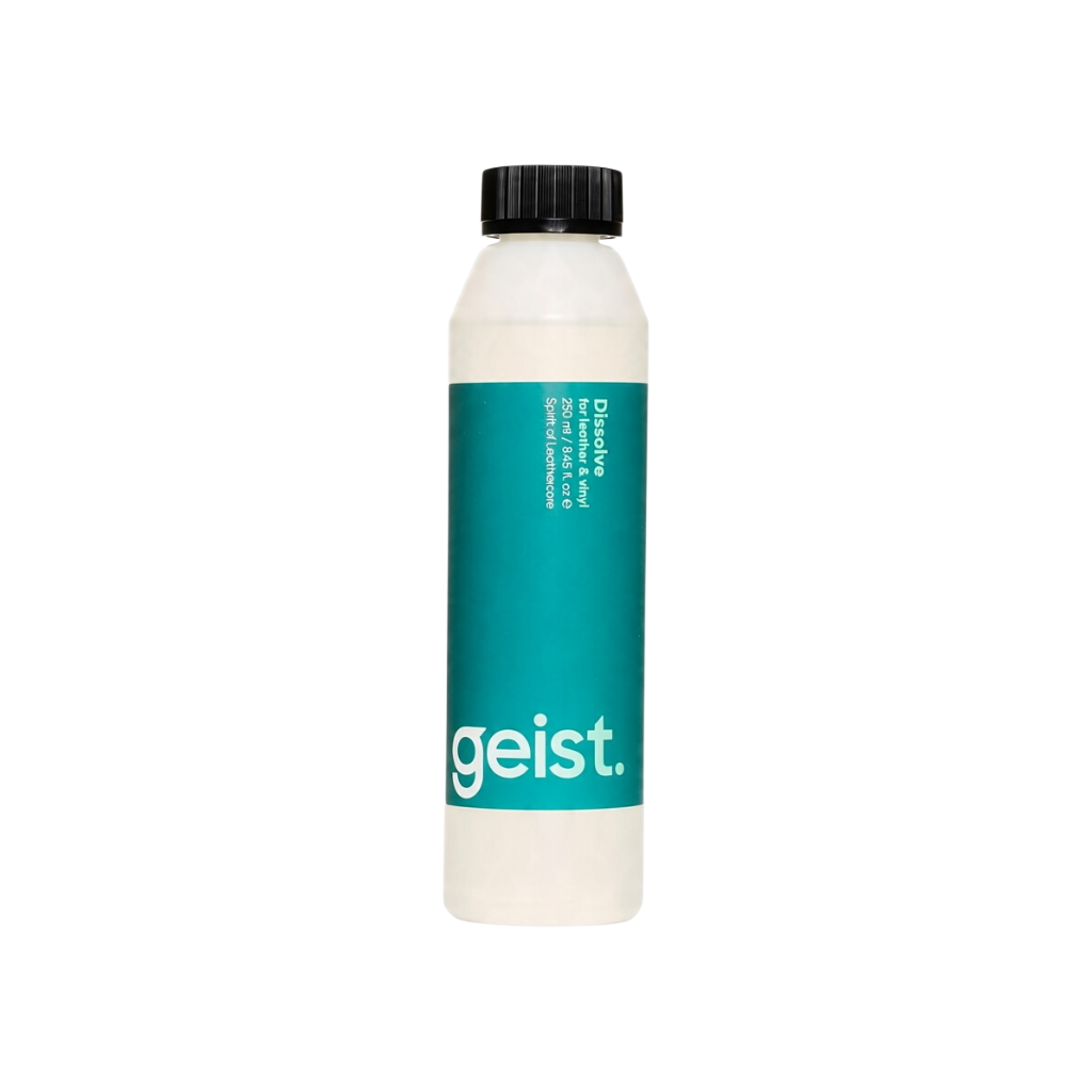 The Detail Warehouse Geist Dissolve leather finish stripper in a 1-litre white bottle with a teal label.