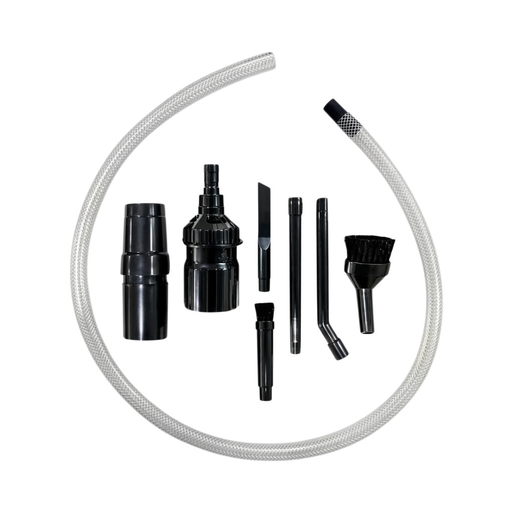 The Detail Warehouse Bigboi SUCKR 8-piece micro vacuum accessory kit with nozzles, brushes, and clear hose for car care.