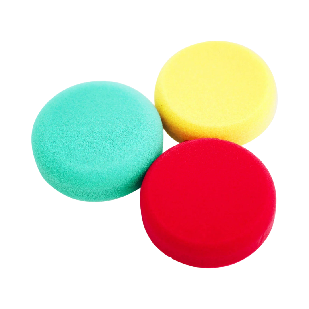 The Detail Warehouse Apex Customs German foam polishing pads in green cutting, yellow polishing, and red finishing
