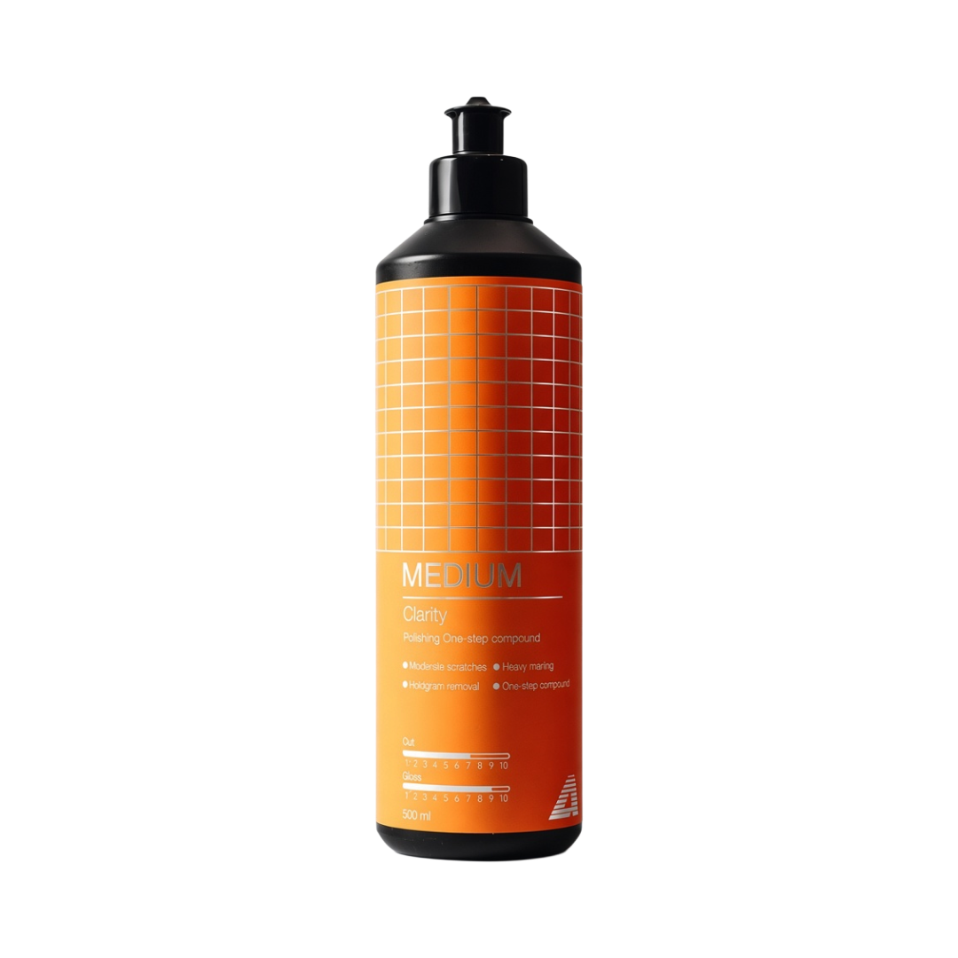 The Detail Warehouse Apex Customs Clarity medium polishing compound in a 500ml orange bottle for car paint correction.