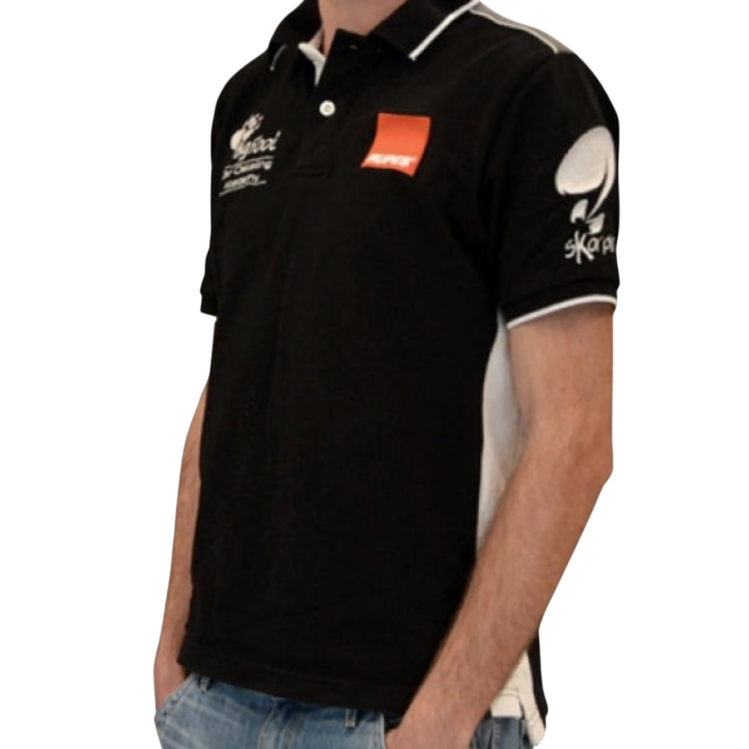 The Detail Warehouse Rupes BigFoot Academy black and white cotton polo shirt with embroidered logos on chest and sleeves