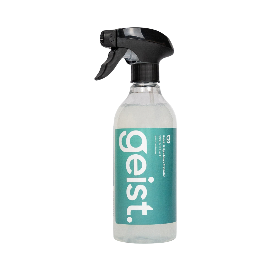 The Detail Warehouse Geist fabric and upholstery protector spray bottle with a teal label on a white background.