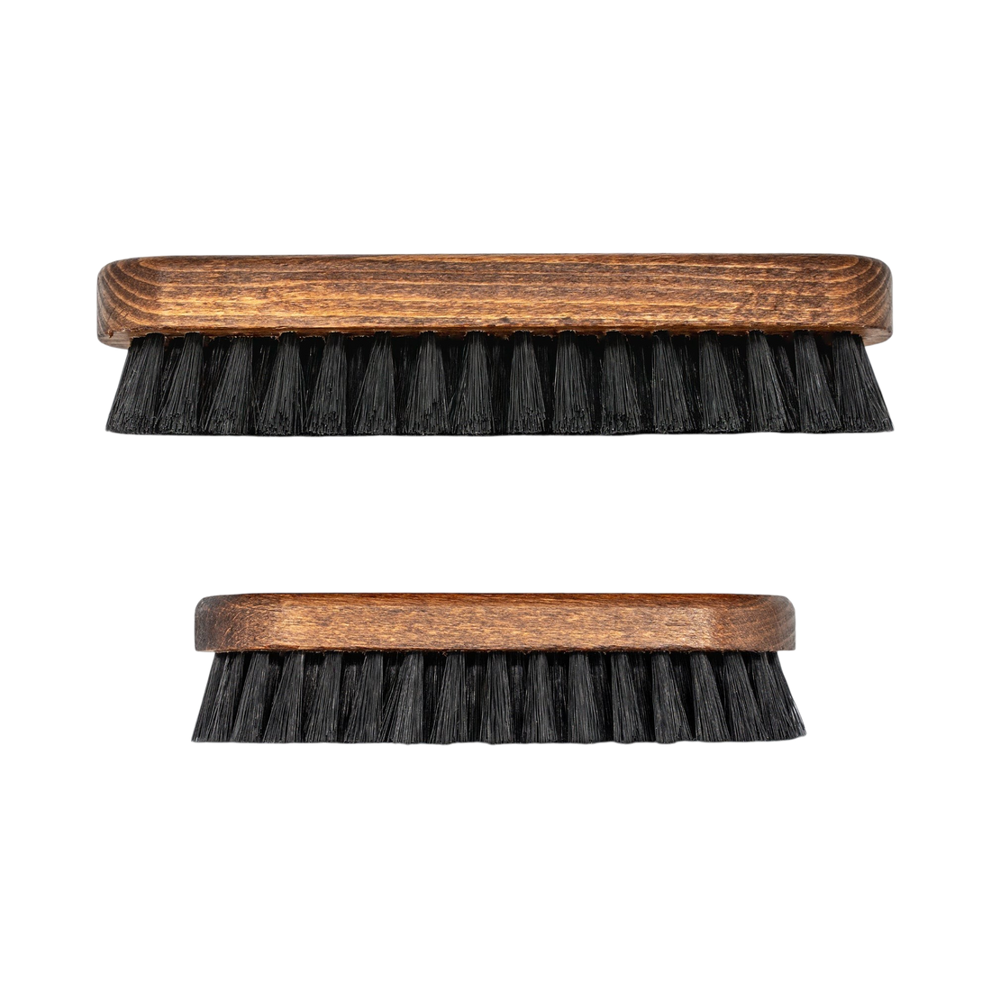 The Detail Warehouse Geist leather and textile cleaning brushes with dark wood handles and white logo branding