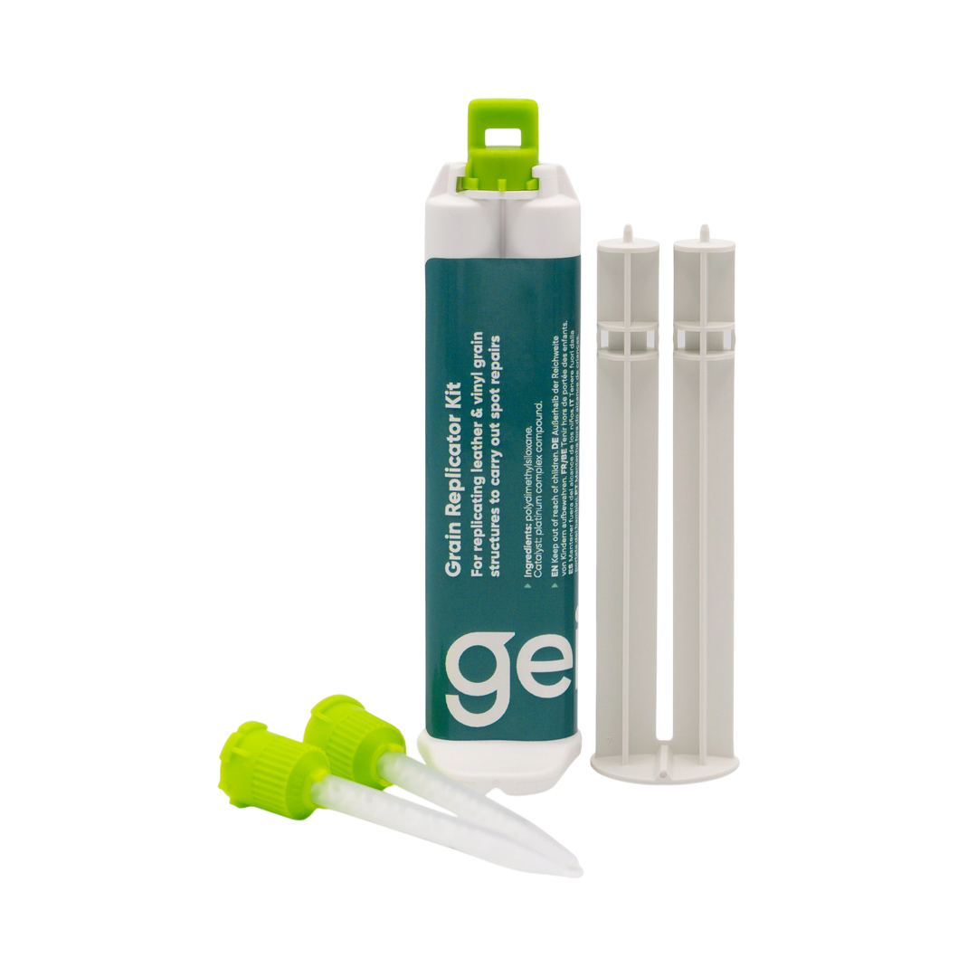 The Detail Warehouse Grain Replicator Kit with dual-chamber cartridge, trigger, and two green mixing tips.
