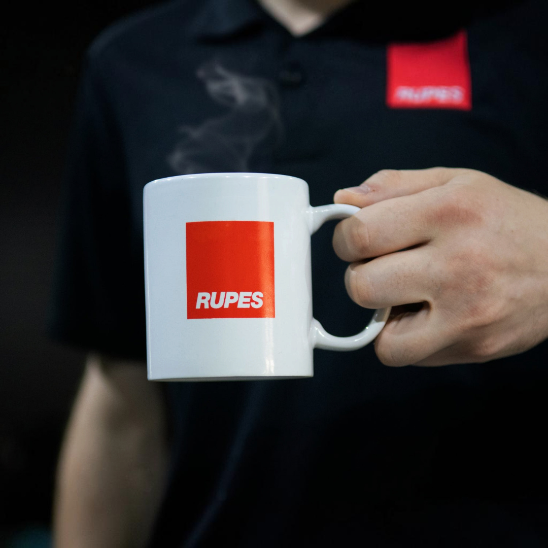 The Detail Warehouse white ceramic coffee and tea mug featuring the red Rupes logo, made in Italy.