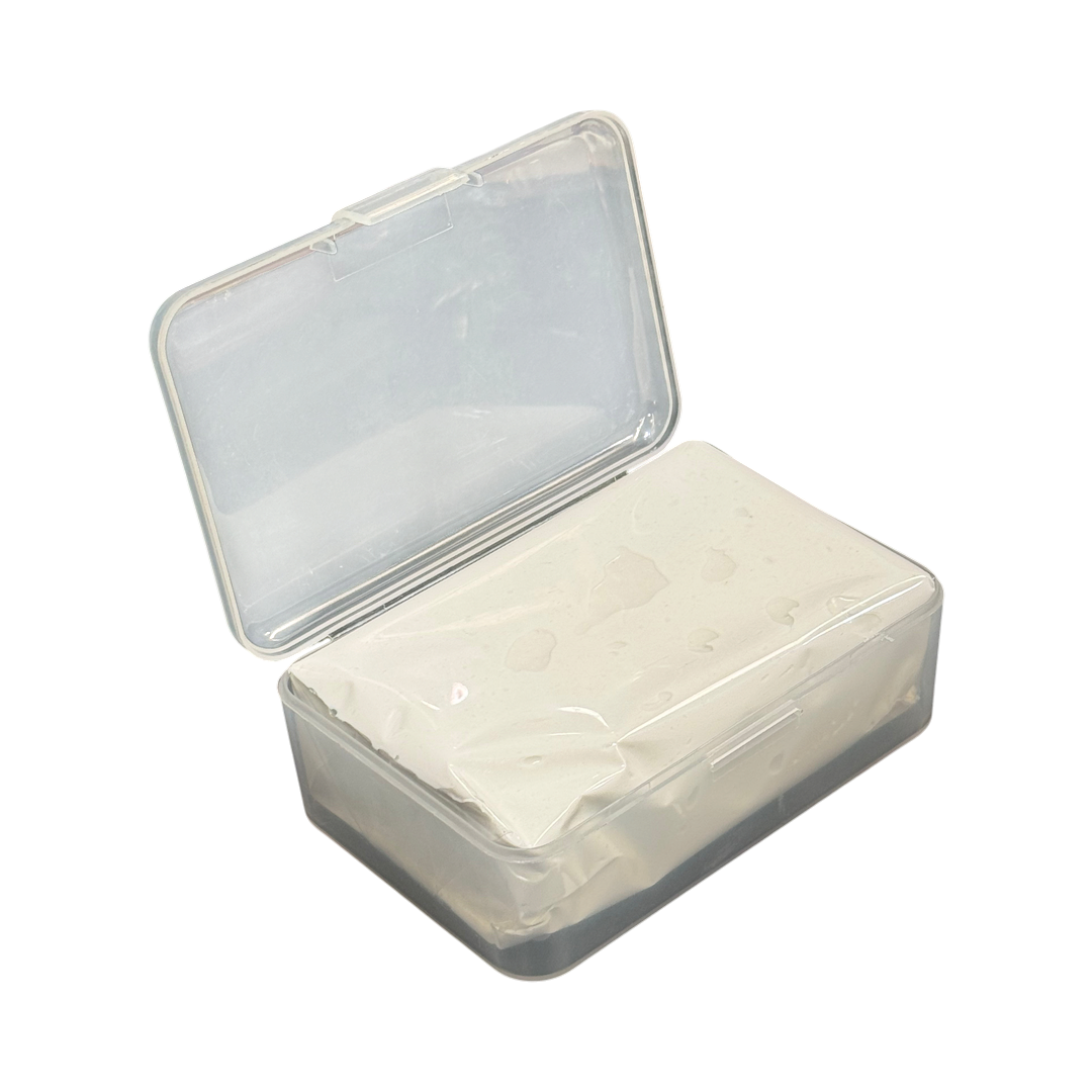 The Detail Warehouse Max Protect white ultra fine clay bar for automotive paint decontamination in a clear plastic case.