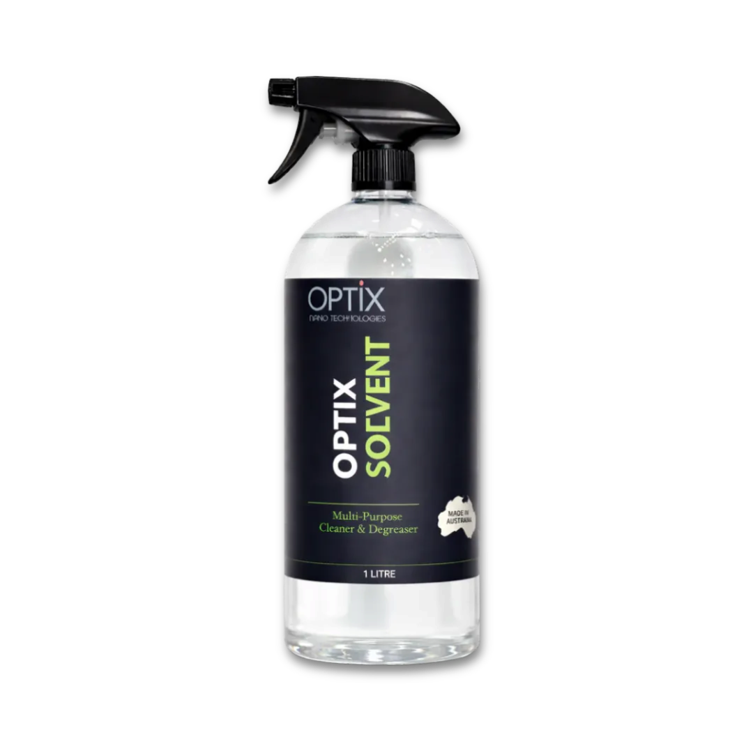The Detail Warehouse OPTiX Solvent Cleaner in a 1-litre spray bottle for removing tar, grease, and adhesive residue.