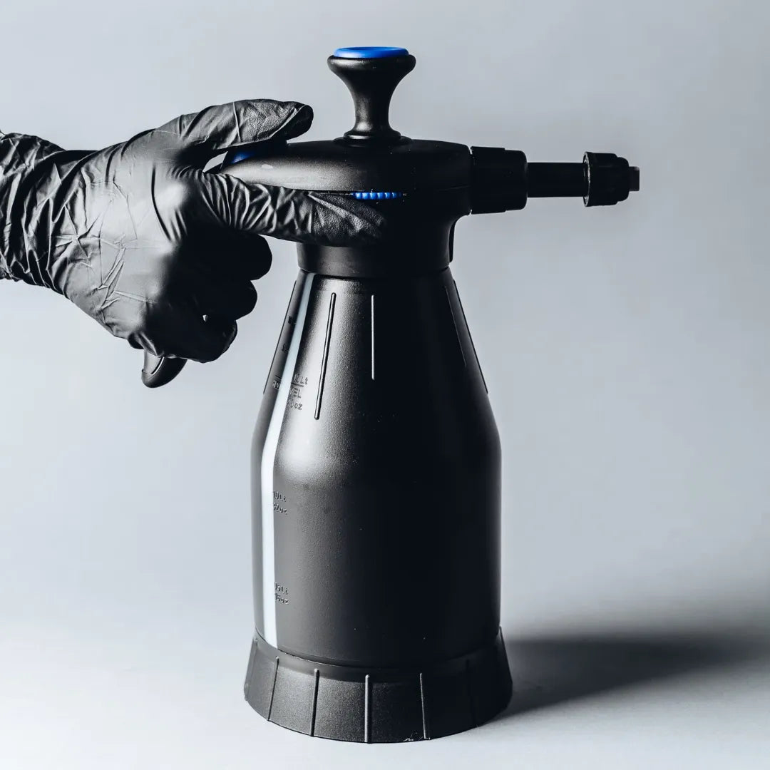 The Detail Warehouse 2L Apex pressure sprayer in black with blue accents for car detailing and foaming chemicals.
