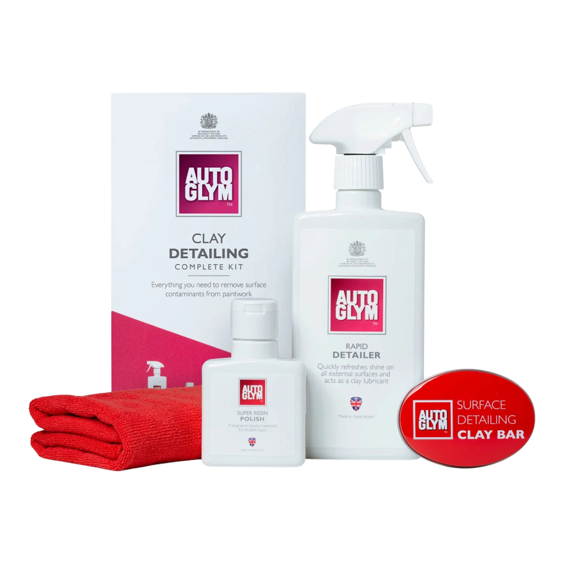 The Detail Warehouse Autoglym Clay Decontamination Kit including clay bar, rapid detailer, polish, and red cloth.