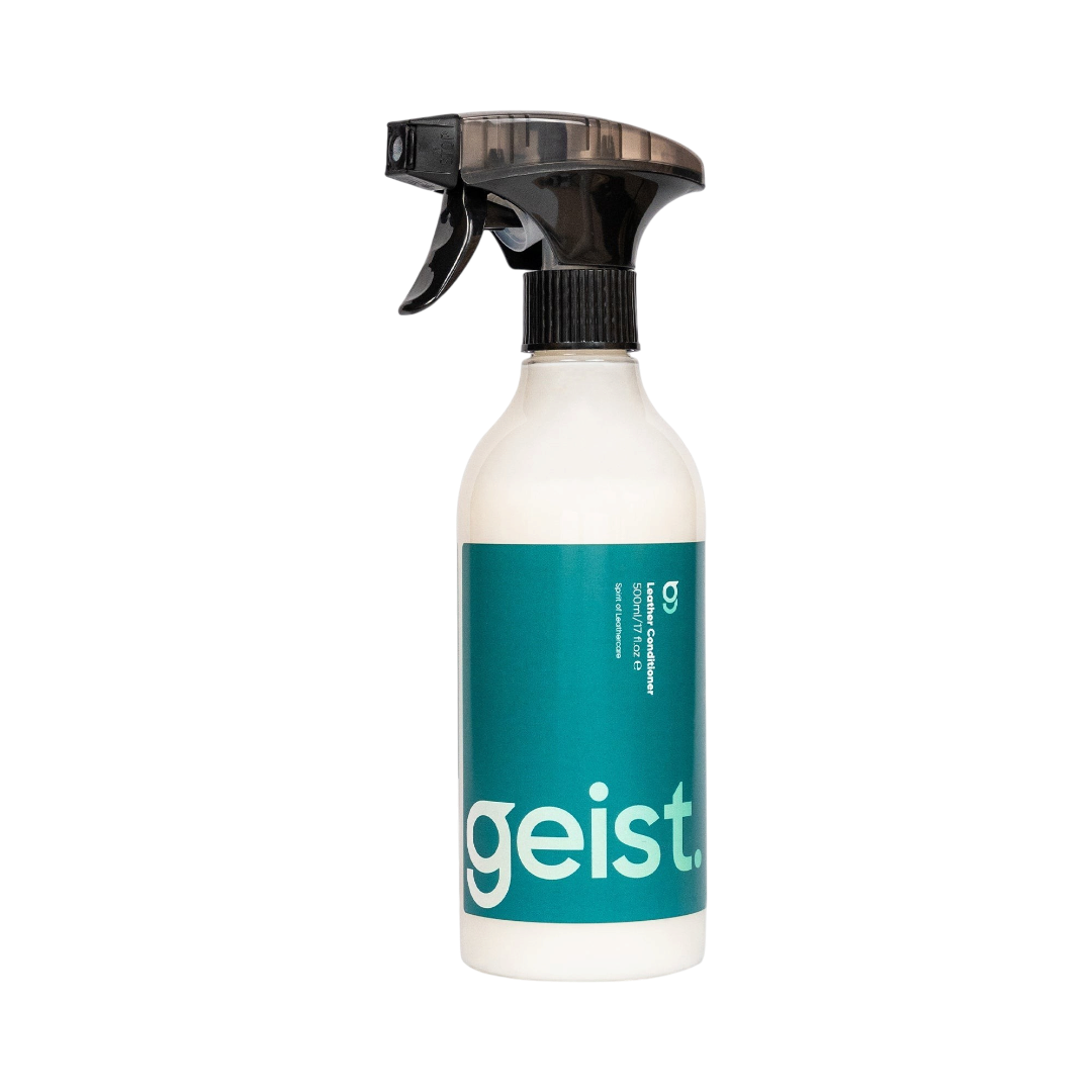 Spray bottle with 'geist' leather conditioner on a white background