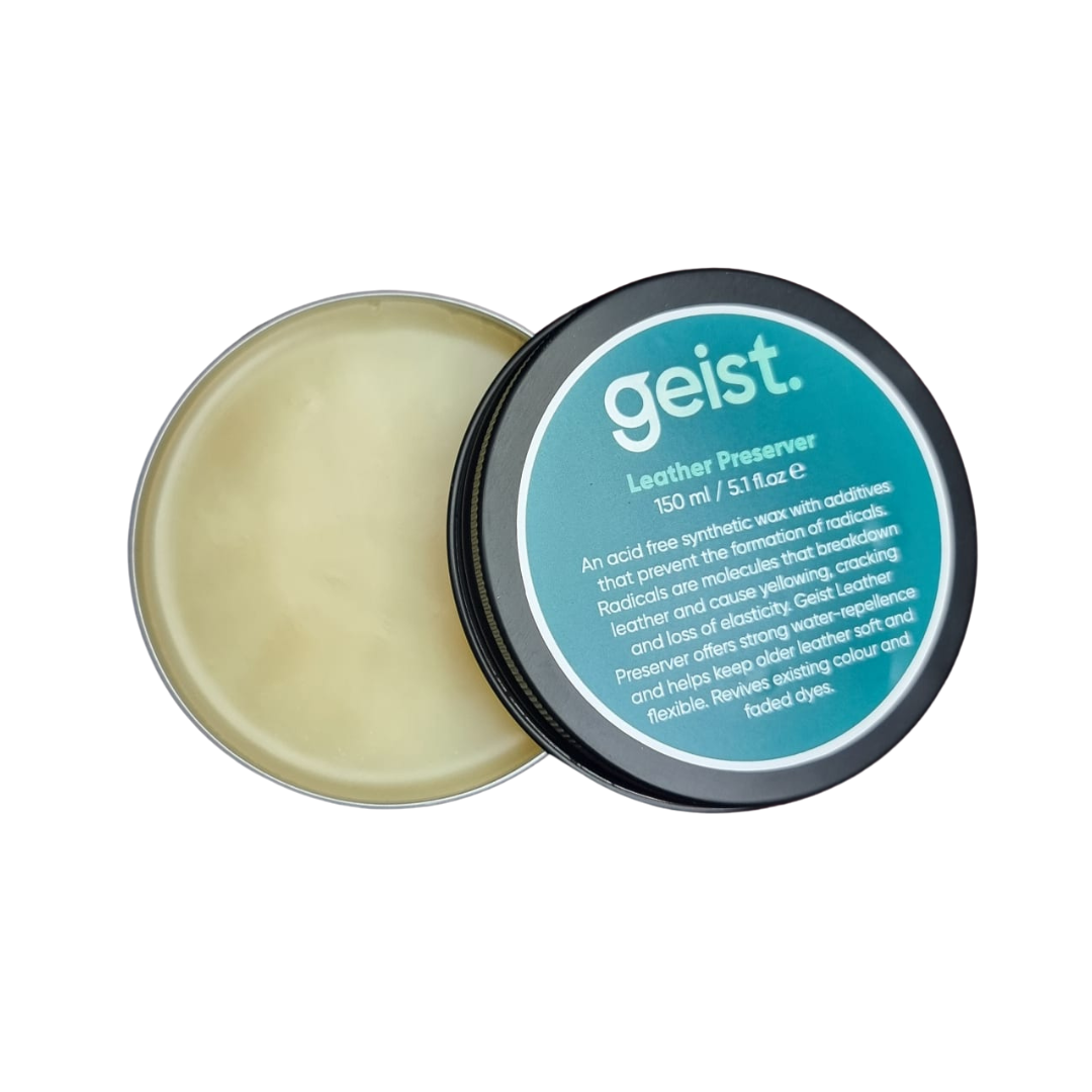 Geist leather preserver tin with open lid on a white background