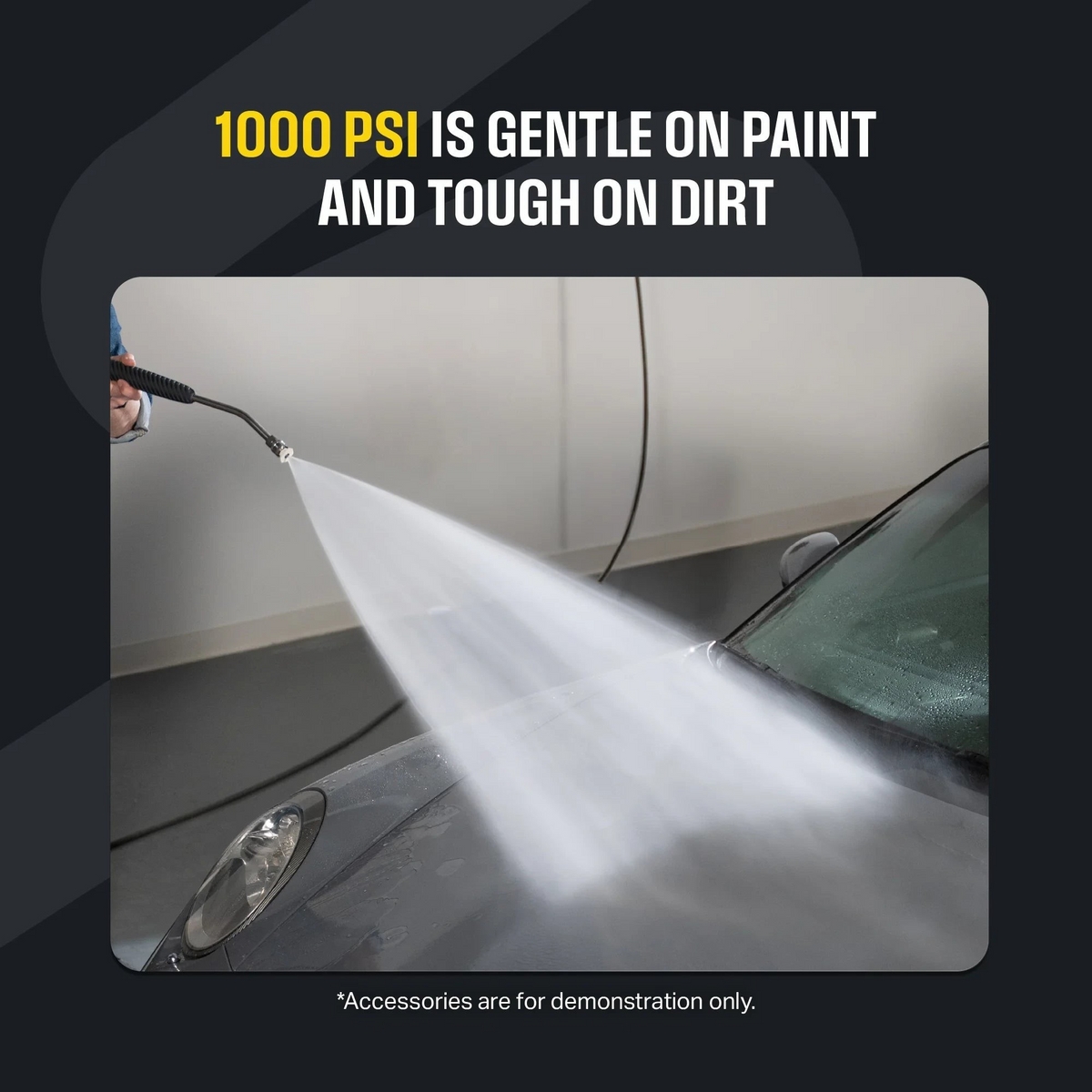The Detail Warehouse Active 2.3 pressure washer spraying a wide water fan onto a car hood for gentle paint cleaning