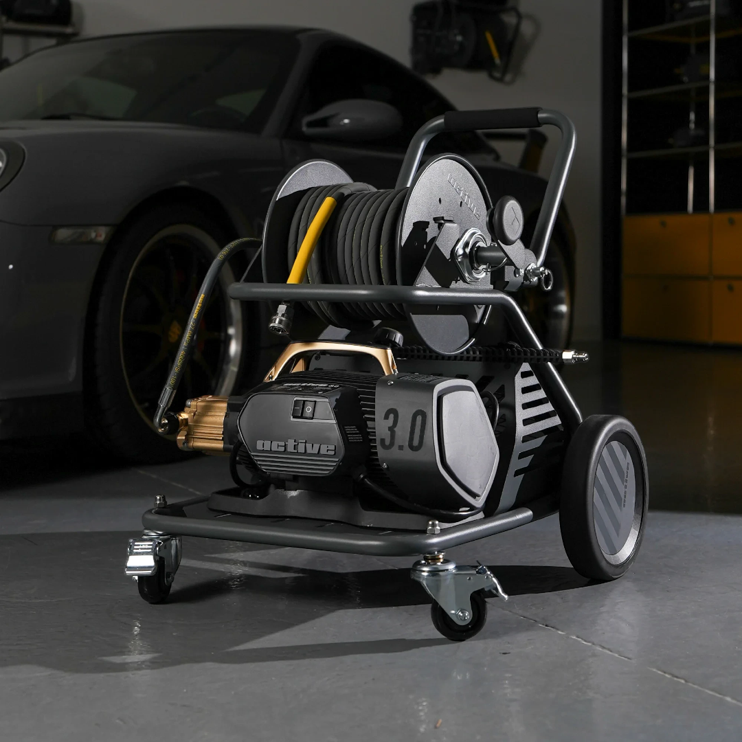 The Detail Warehouse ACTIVE Wash Cart and Hose Reel with pressure washer mounted on a mobile stainless steel frame.