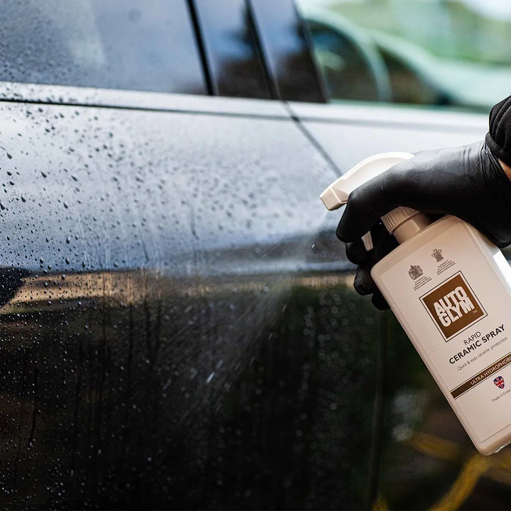 The Detail Warehouse Autoglym Rapid Ceramic Spray being applied to a car door to create a hydrophobic gloss finish