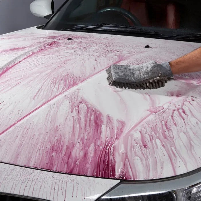 The Detail Warehouse Autoglym Magma active paint decontamination turning purple on a white car hood during cleaning