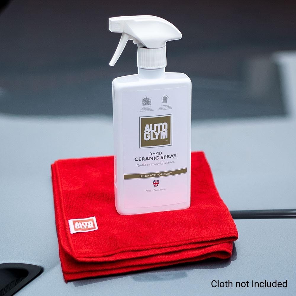 The Detail Warehouse Autoglym Rapid Ceramic Spray bottle with a trigger nozzle sitting on a folded red microfiber cloth