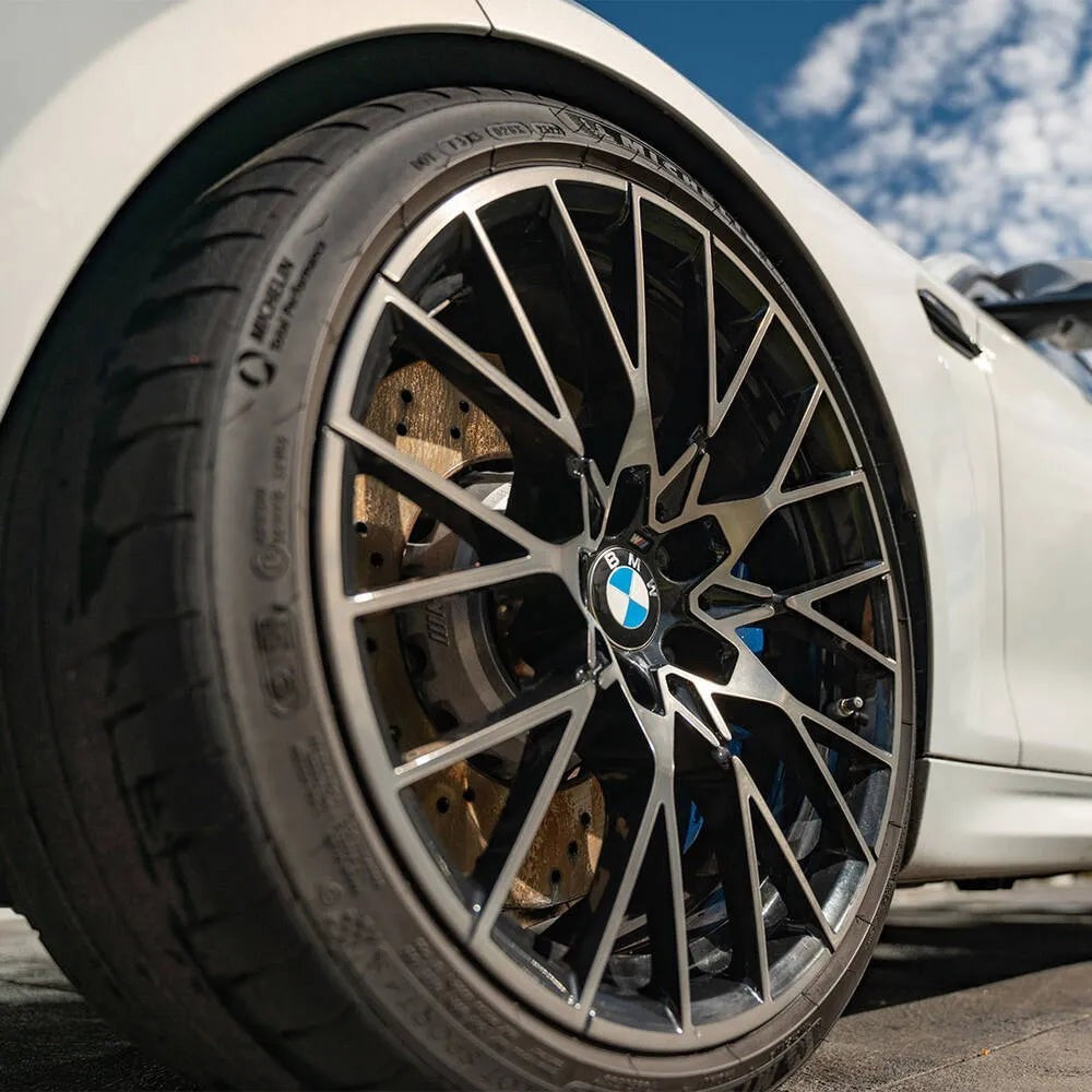 The Detail Warehouse Autoglym Advanced Wheel Cleaner applied to a clean black and silver alloy car wheel