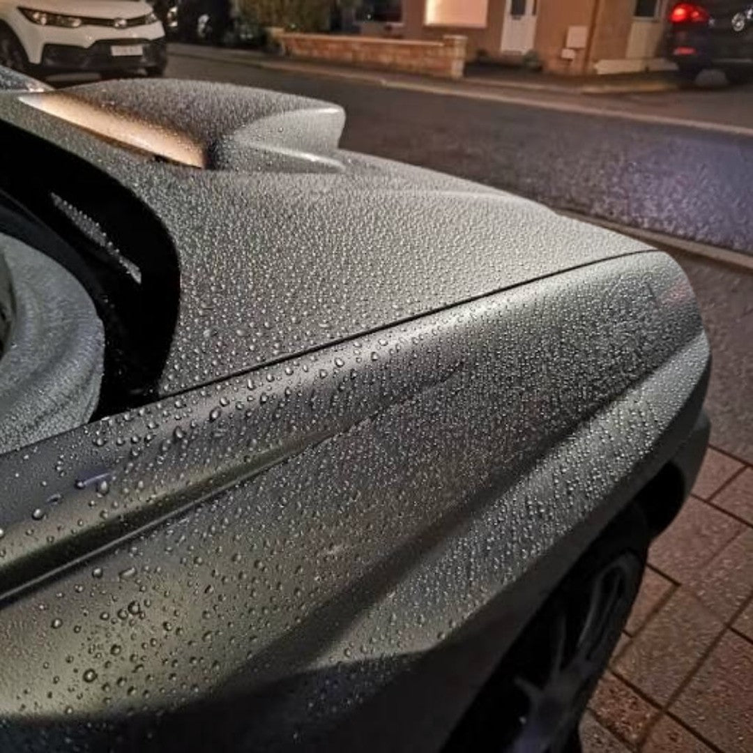 The Detail Warehouse Autoglym Rapid Ceramic Spray creating a hydrophobic water beading effect on a grey car hood