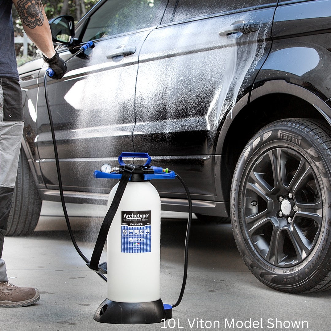 The Detail Warehouse Epoca 5L PRO pressure foamer with EPDM seals applying foam to a black car for detailing