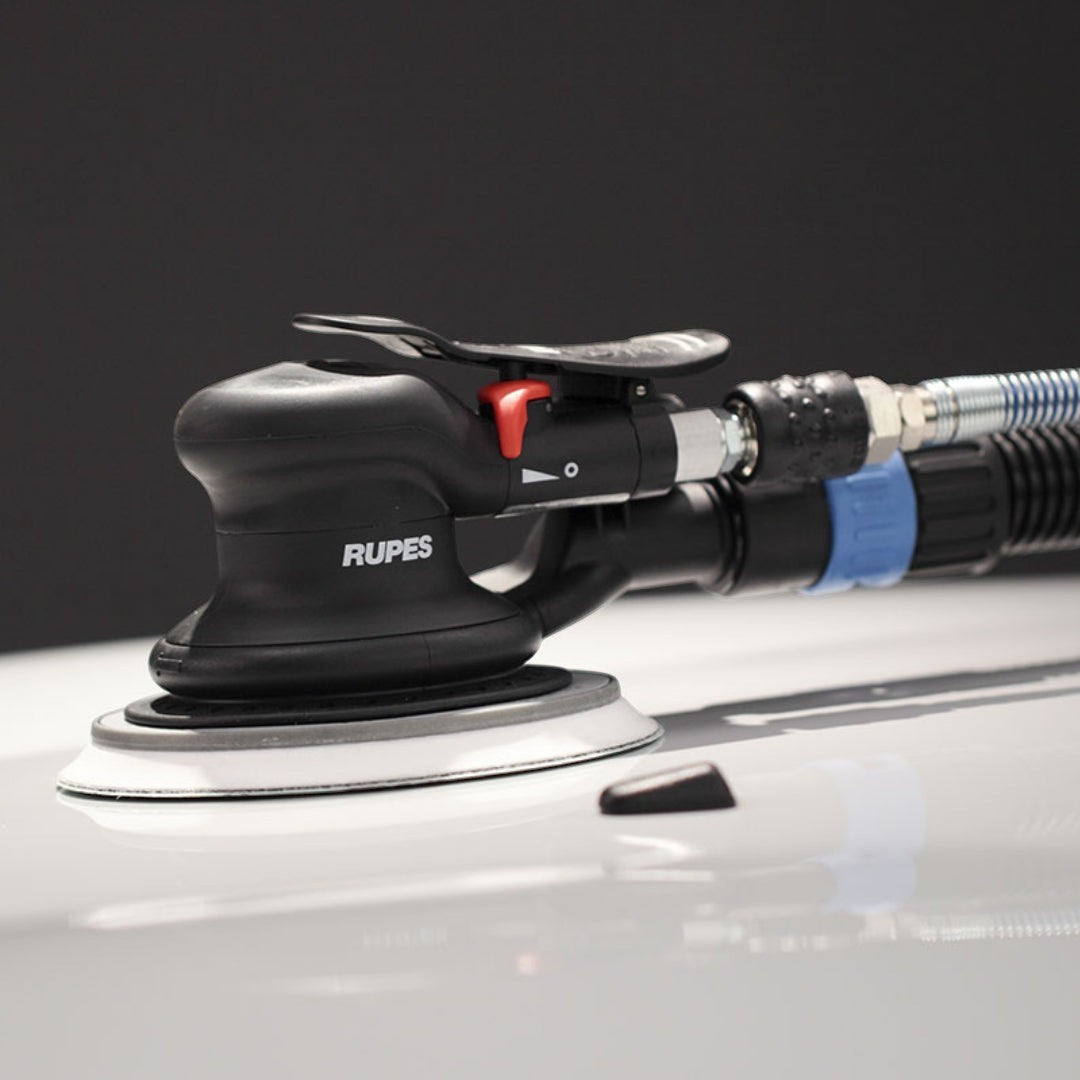 The Detail Warehouse Rupes RH359A Skorpio III pneumatic random orbital palm sander with a 9mm orbit and vacuum port.