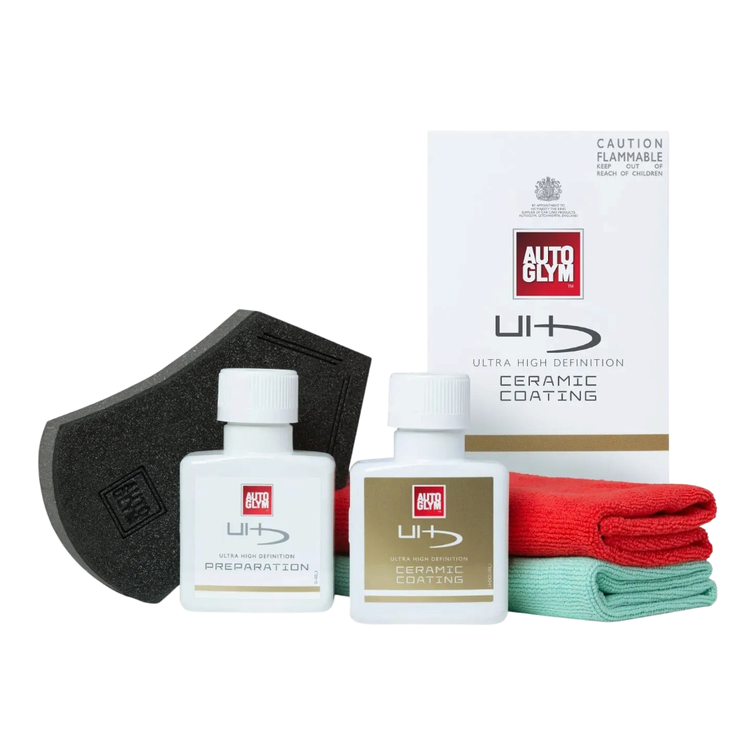 The Detail Warehouse Autoglym UHD Ceramic Coating Kit with prep solution, coating bottle, applicator, and microfiber cloths